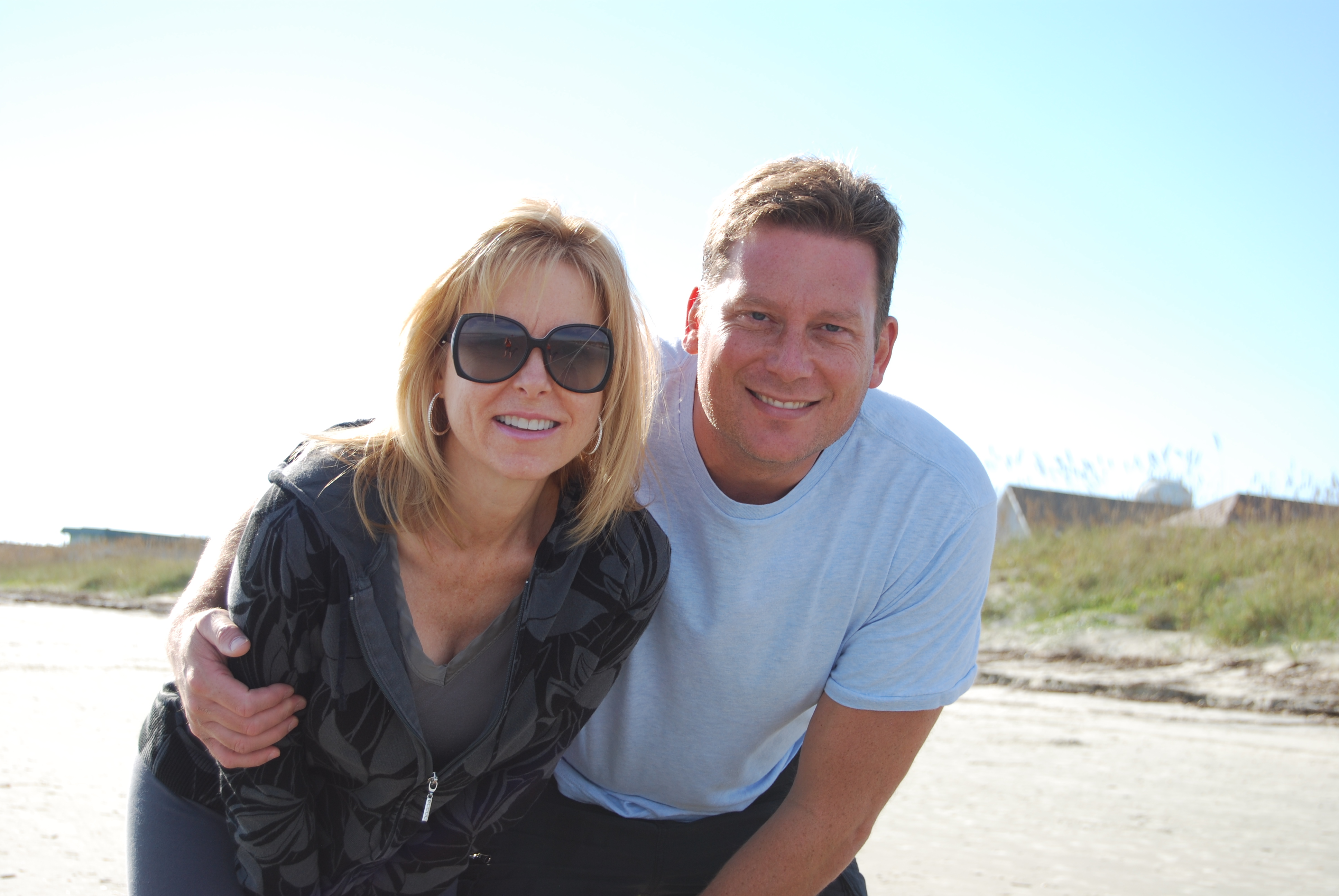 a photo of Dr. Jennifer Miller and Dr. Michael Miller a the beach